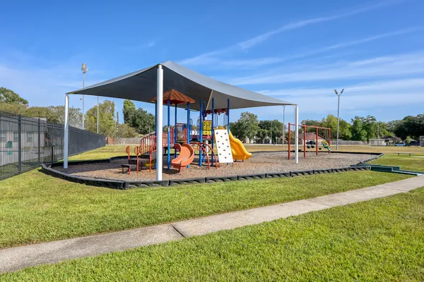 a view of a park with slide