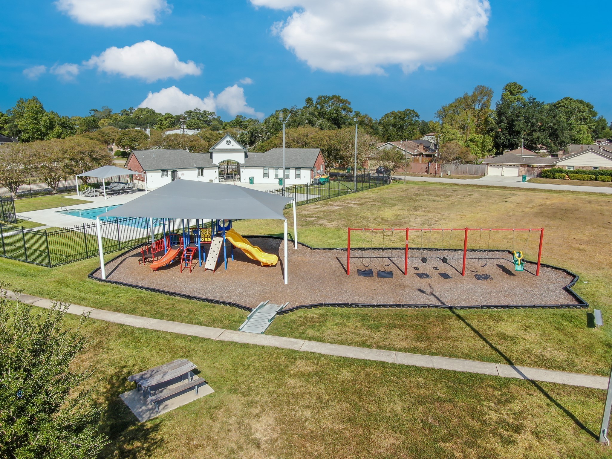 3406 Hartfield Lane Spring, TX 77388 - Photo 44 of 44 a view of a swimming pool with an outdoor seating