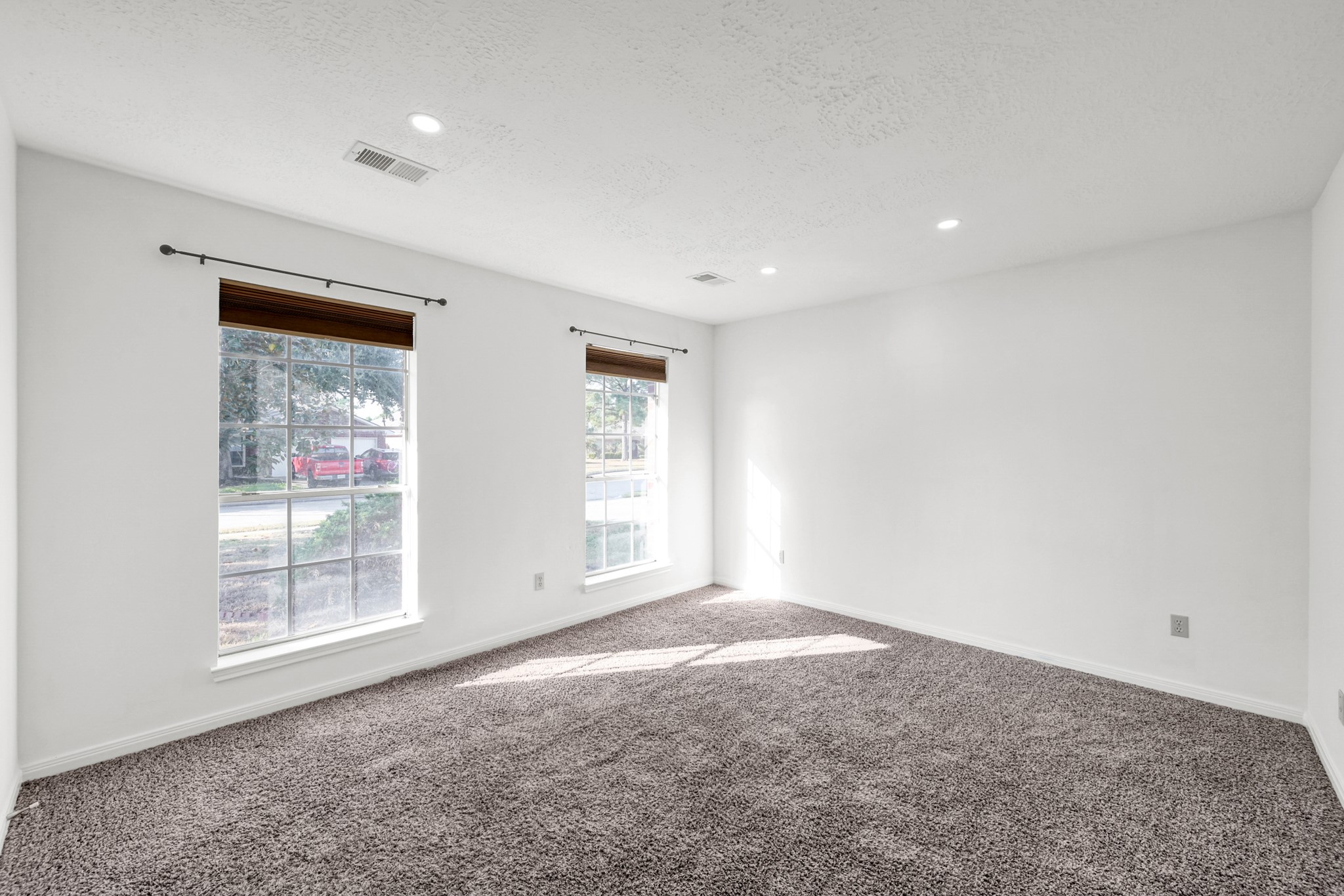 3406 Hartfield Lane Spring, TX 77388 - Photo 6 of 44 a view of an empty room with a window