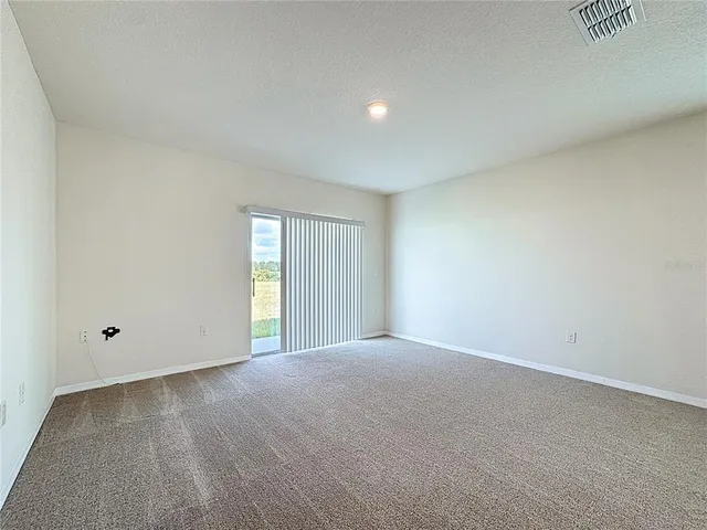 a view of an empty room with window