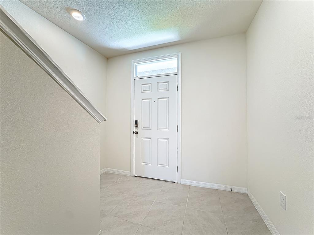 2692 Reddish Egret Bend, Unit 1 St. Cloud, FL 34773 - Photo 2 of 30 a view of an empty room
