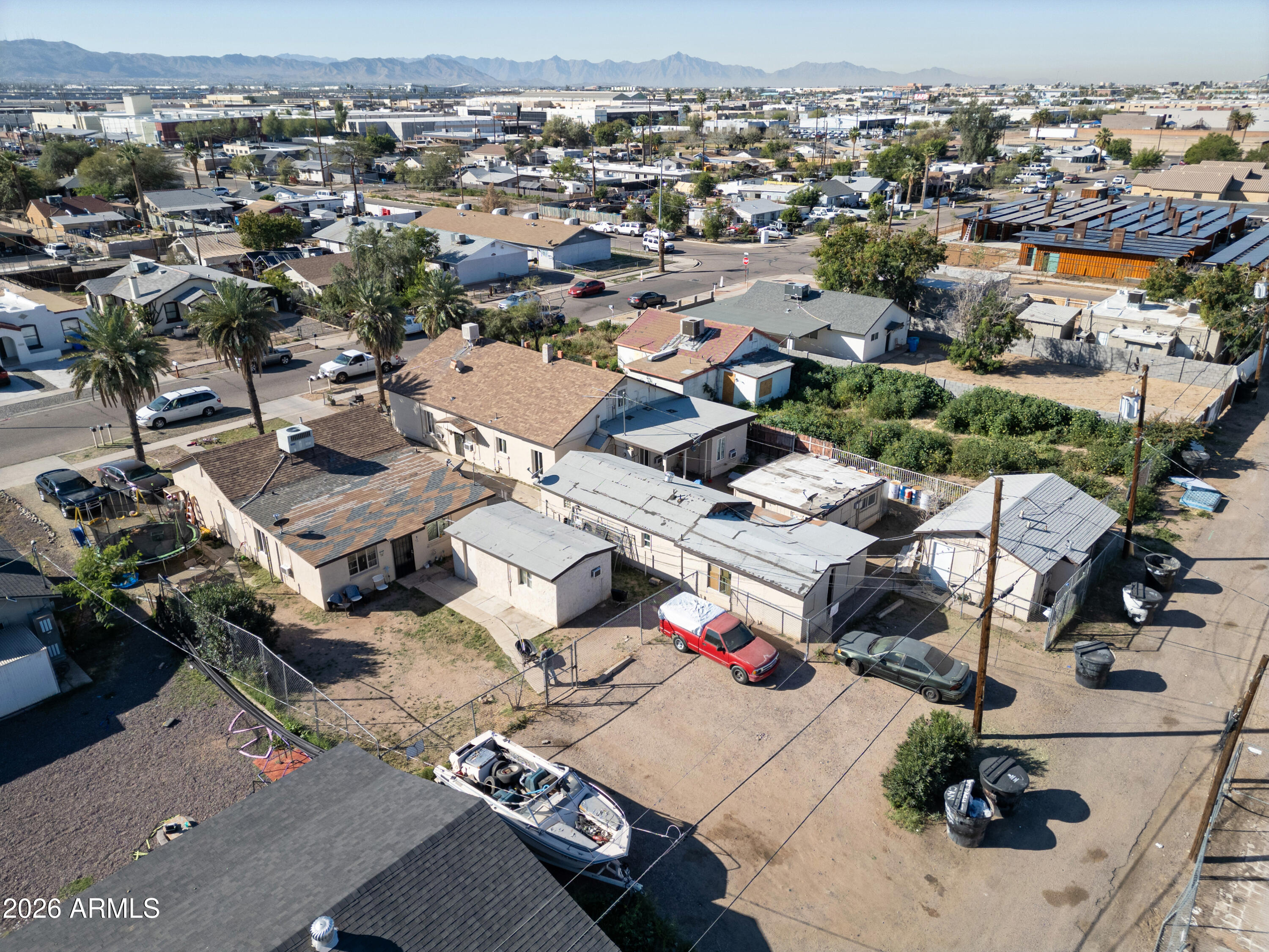 2916 East Monroe Street Phoenix, AZ 85034 - Photo 4 of 11 an aerial view of a city with lots of residential buildings