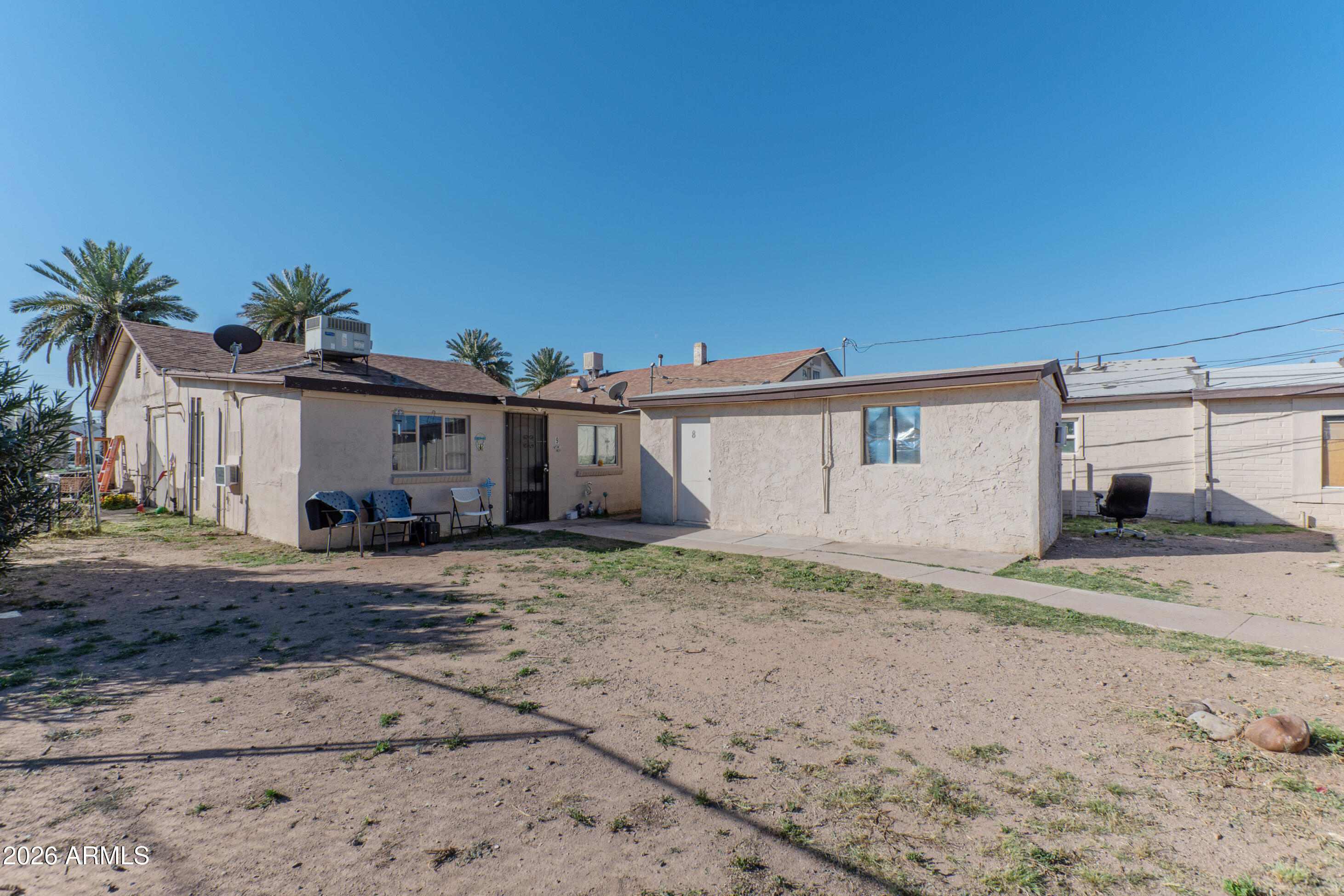 2916 East Monroe Street Phoenix, AZ 85034 - Photo 5 of 11 a view of a house with a patio