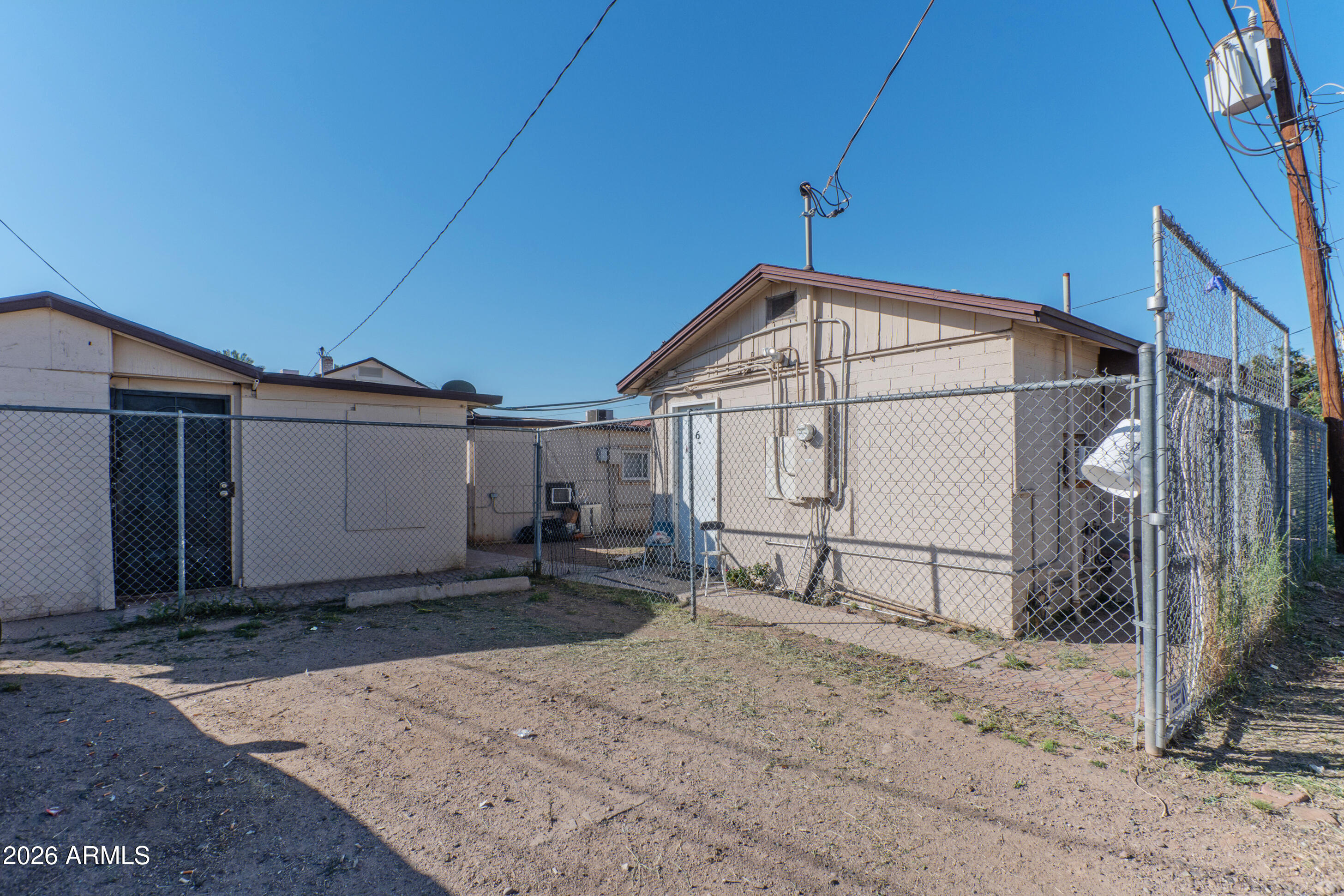 2916 East Monroe Street Phoenix, AZ 85034 - Photo 6 of 11 a view of a house with backyard