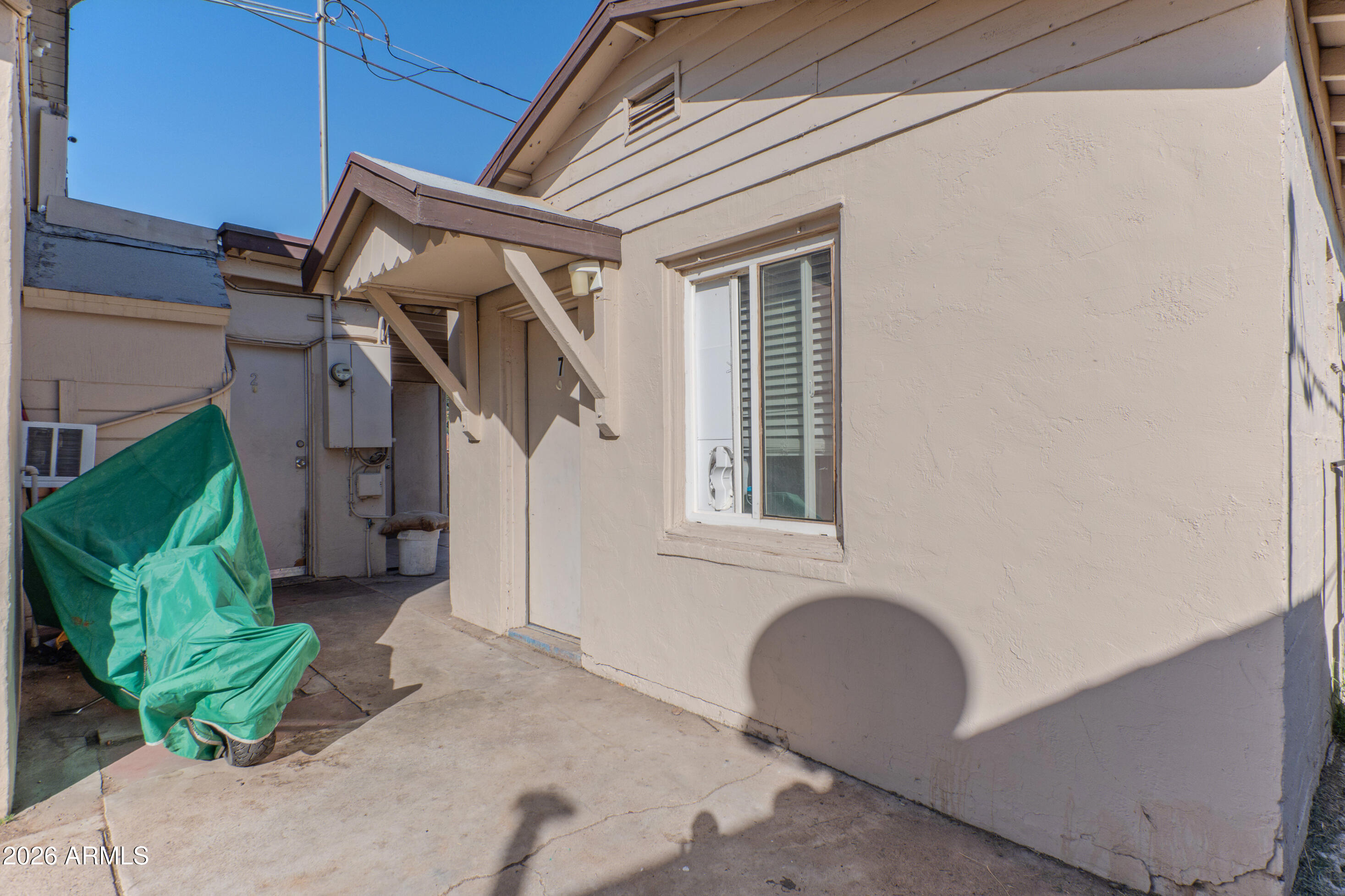 2916 East Monroe Street Phoenix, AZ 85034 - Photo 7 of 11 a house view with a backyard space