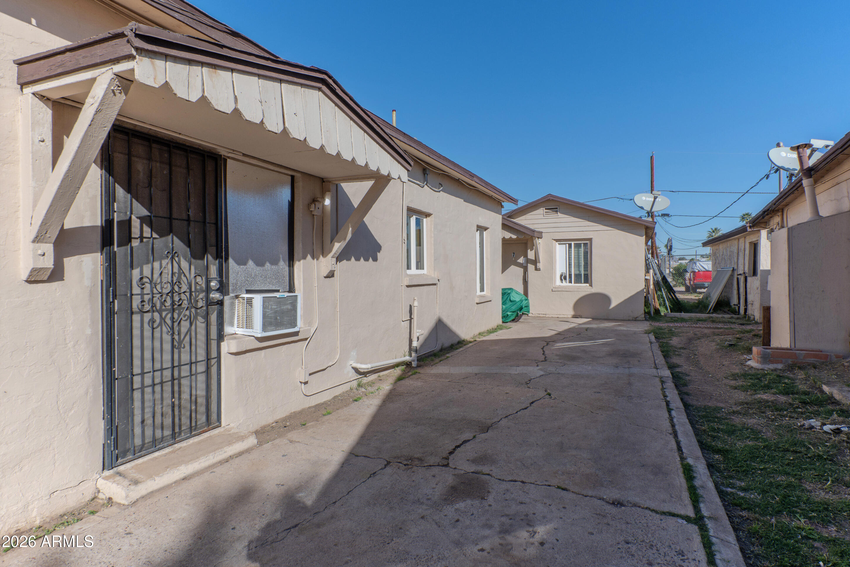 2916 East Monroe Street Phoenix, AZ 85034 - Photo 8 of 11 a view of house with a street