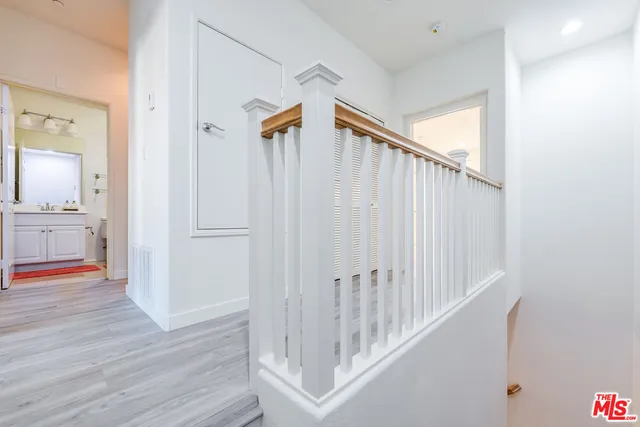 a view of entryway with wooden floor