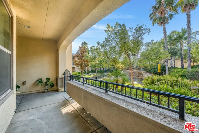 a view of a balcony with lake view