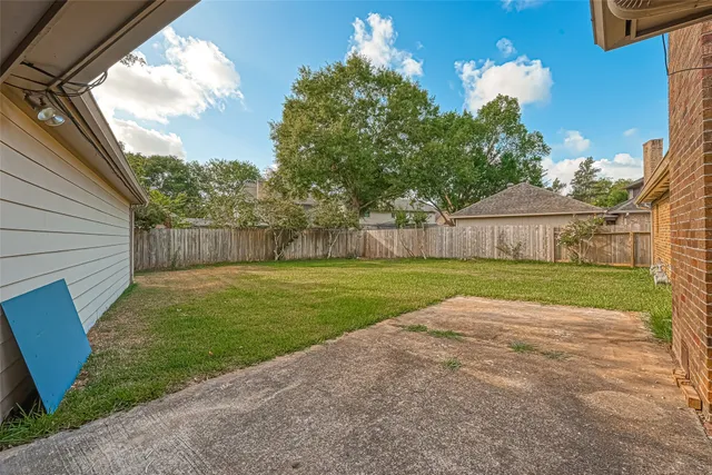 a view of backyard with green space