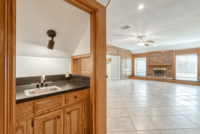 a bathroom with a sink double vanity and a mirror