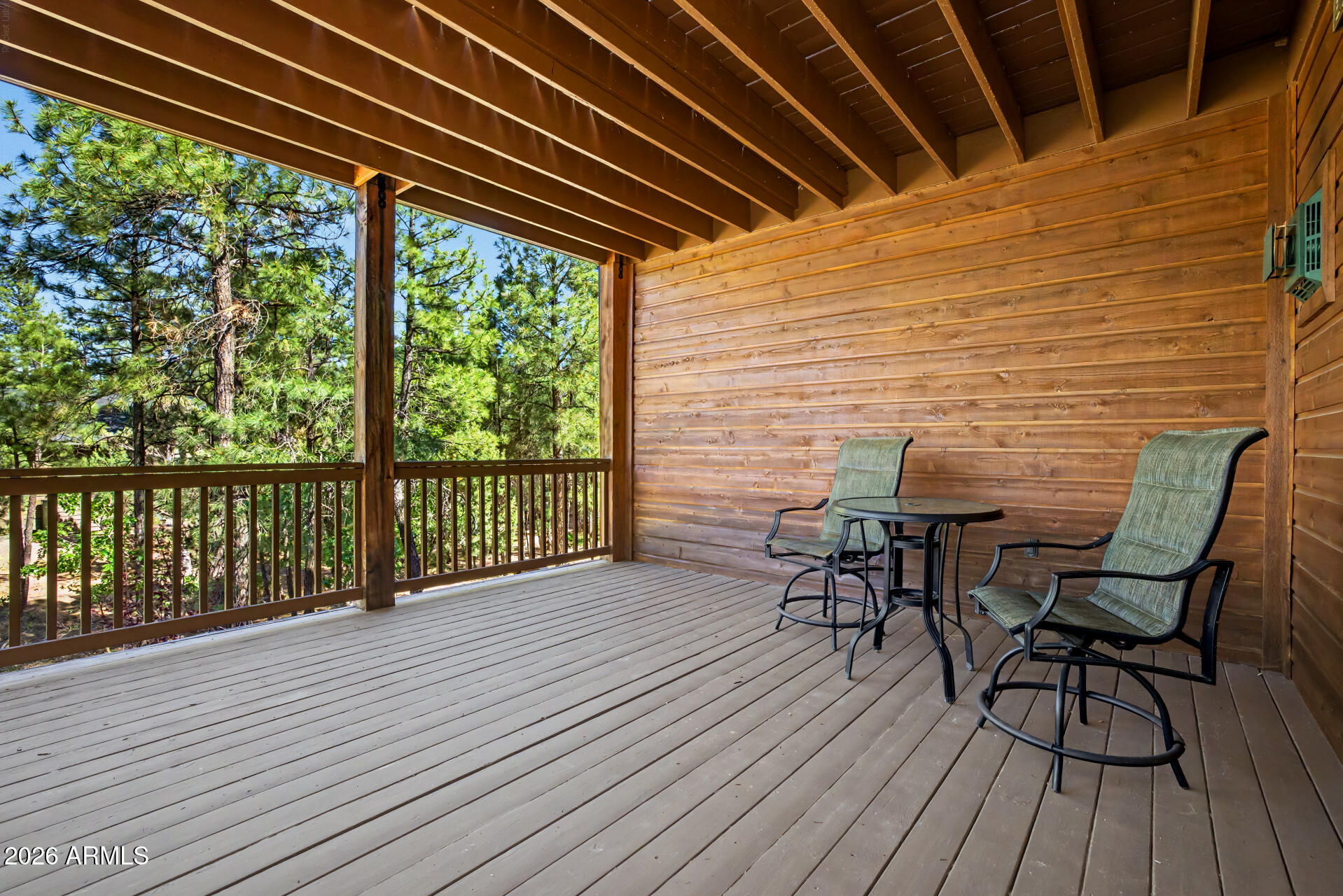 1681 South Jimson Loop Show Low, AZ 85901 - Photo 48 of 105 a view of a chairs and table on the wooden deck