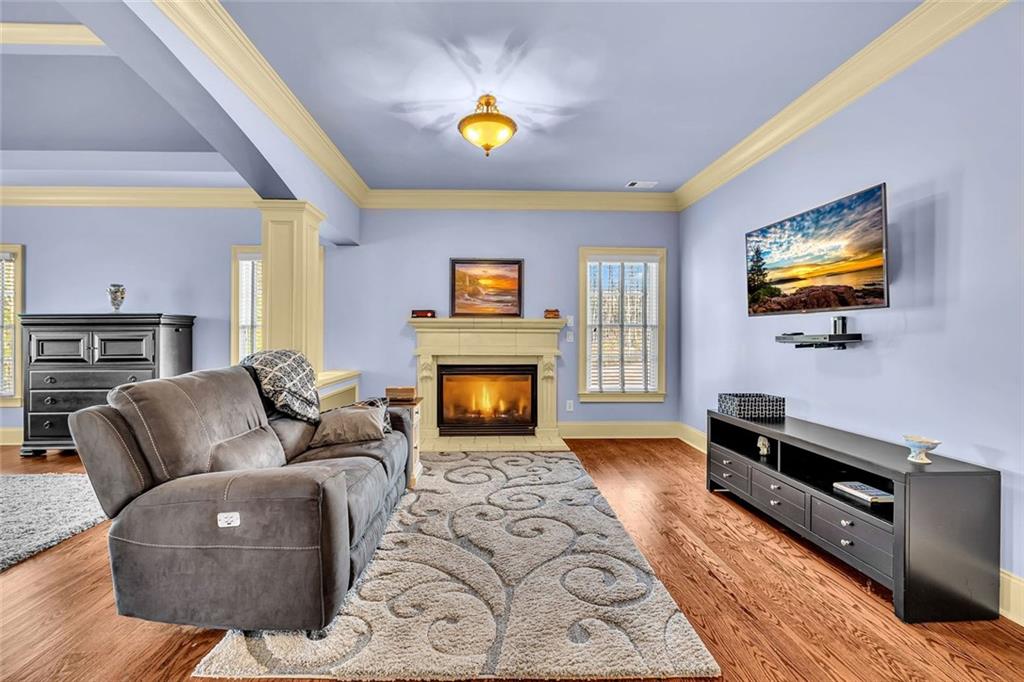 245 Arledge Lane Southwest Atlanta, GA 30331 - Photo 20 of 47 a living room with furniture and a flat screen tv