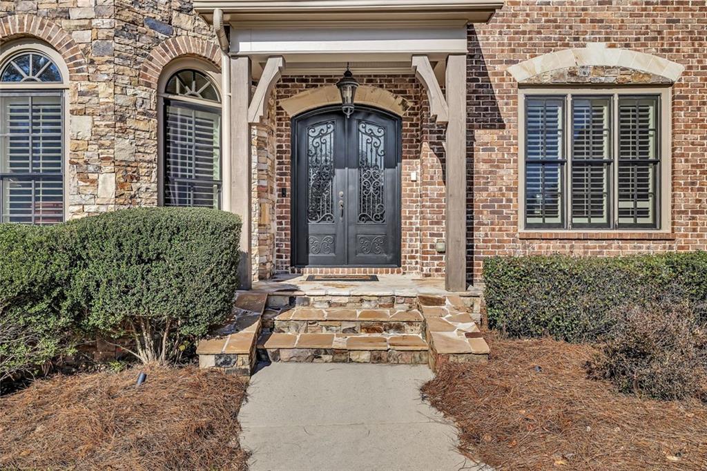 245 Arledge Lane Southwest Atlanta, GA 30331 - Photo 3 of 47 a front view of a house with a yard