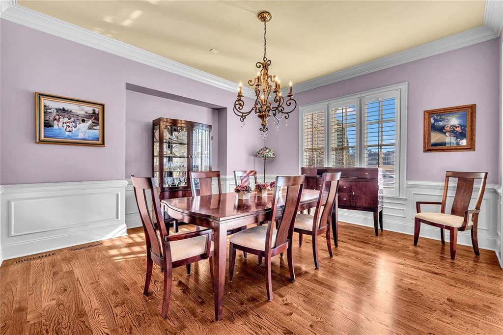 245 Arledge Lane Southwest Atlanta, GA 30331 - Photo 7 of 47 a view of a dining room with furniture window and wooden floor