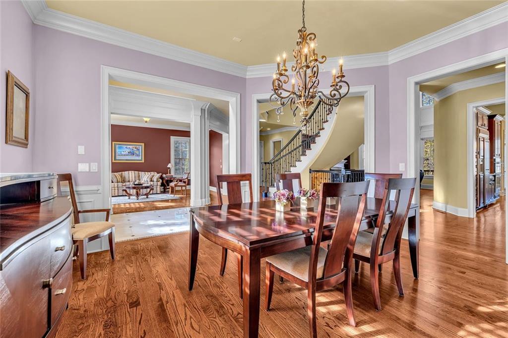 245 Arledge Lane Southwest Atlanta, GA 30331 - Photo 8 of 47 a view of a dining room with furniture and wooden floor