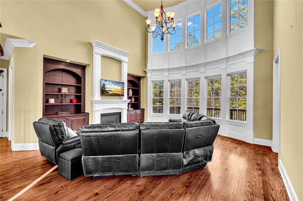 245 Arledge Lane Southwest Atlanta, GA 30331 - Photo 10 of 47 a living room with furniture and a fireplace