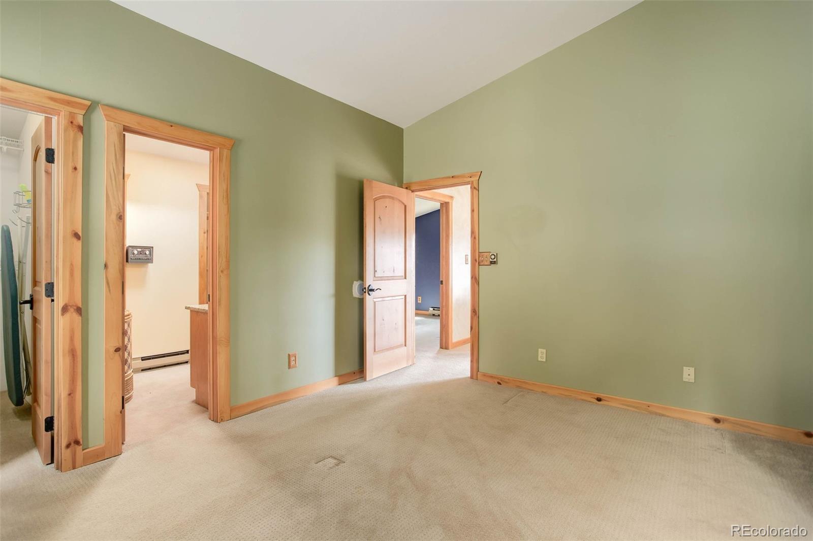 9209 Fallen Rock Road Conifer, CO 80433 - Photo 19 of 33 an empty room with a bathroom and a sink