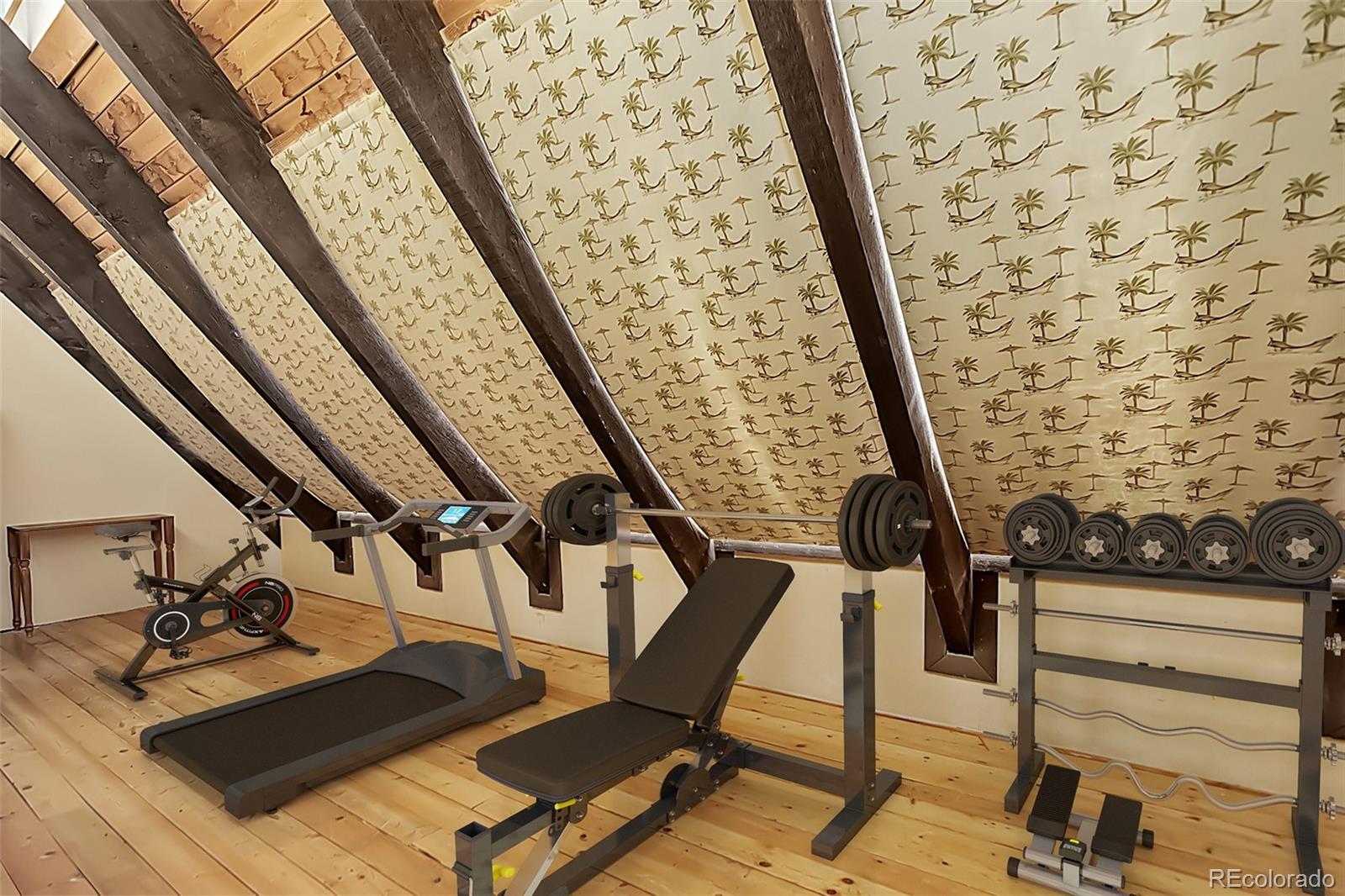 9209 Fallen Rock Road Conifer, CO 80433 - Photo 26 of 33 a view of entryway with wooden floor