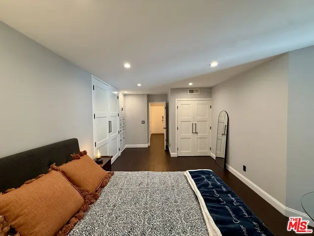 a view of balcony with wooden floor