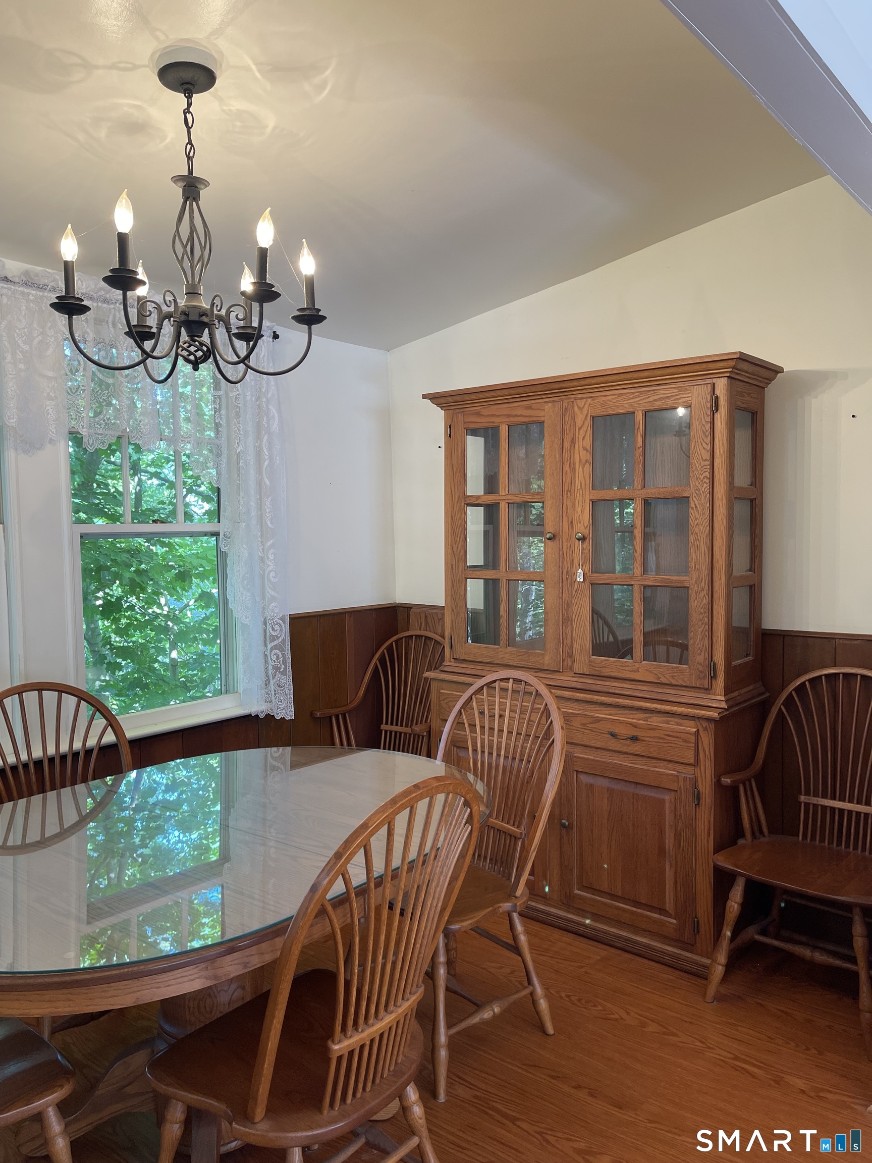 89 Alpine Drive Newtown, CT 06482 - Photo 12 of 32 a view of a dining room with furniture window and outside view