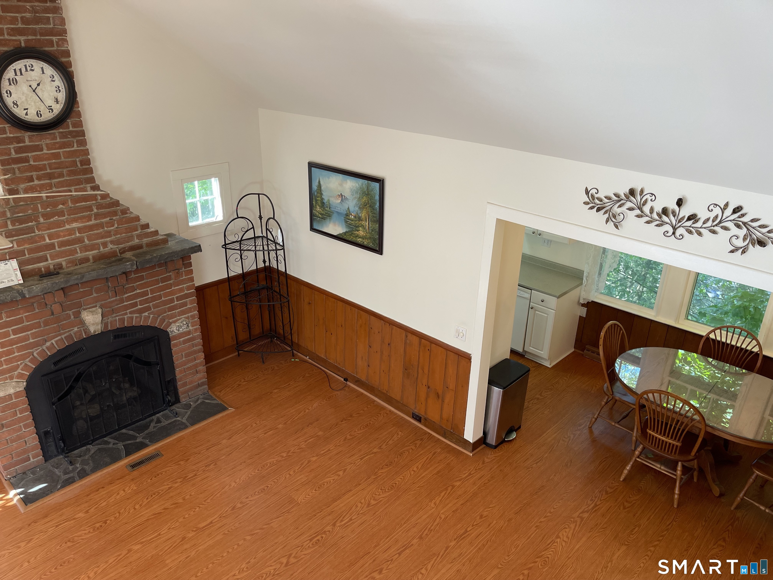 89 Alpine Drive Newtown, CT 06482 - Photo 26 of 32 a view of a livingroom with furniture and a fireplace