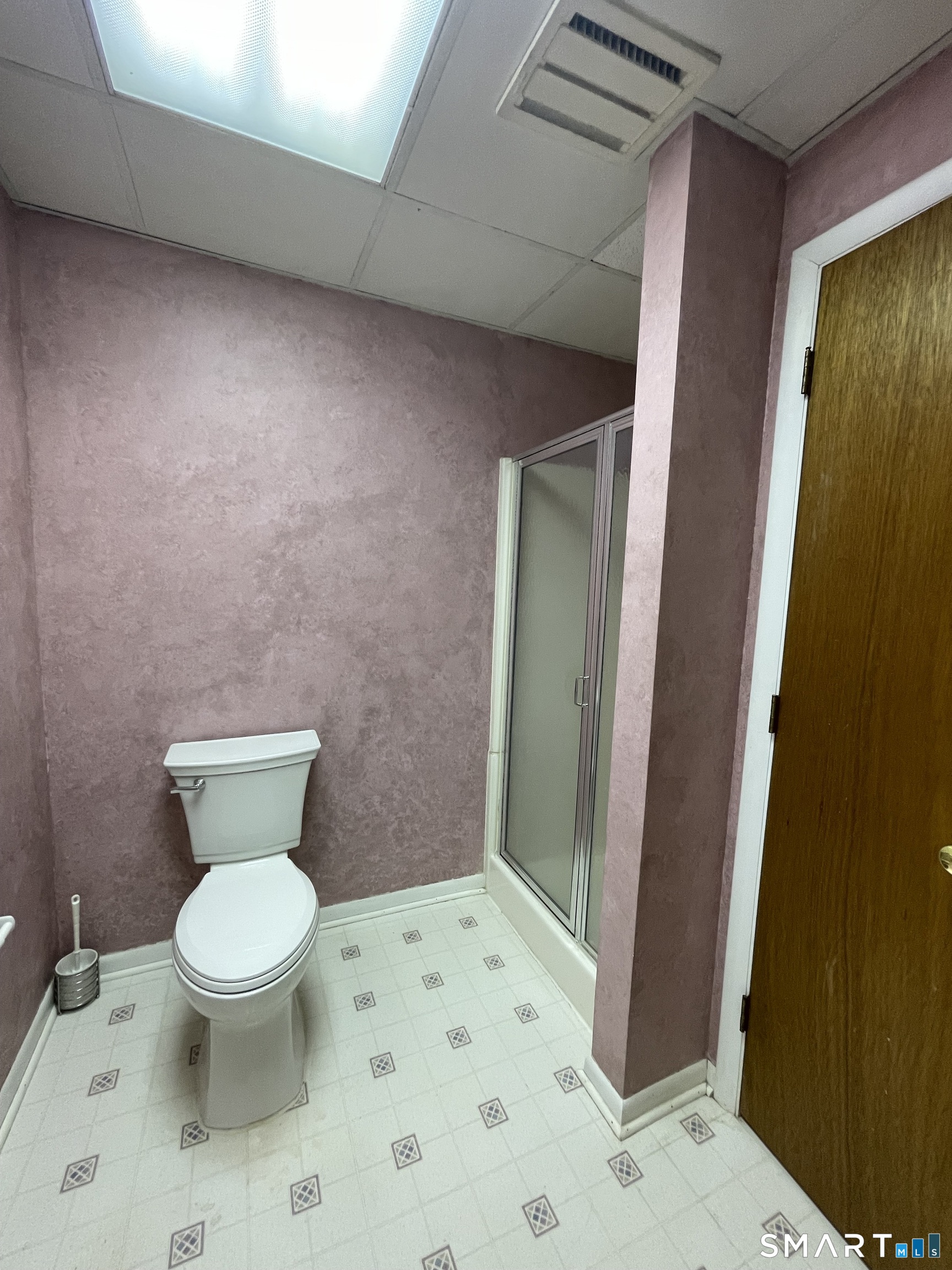 89 Alpine Drive Newtown, CT 06482 - Photo 31 of 32 a bathroom with a toilet and a shower