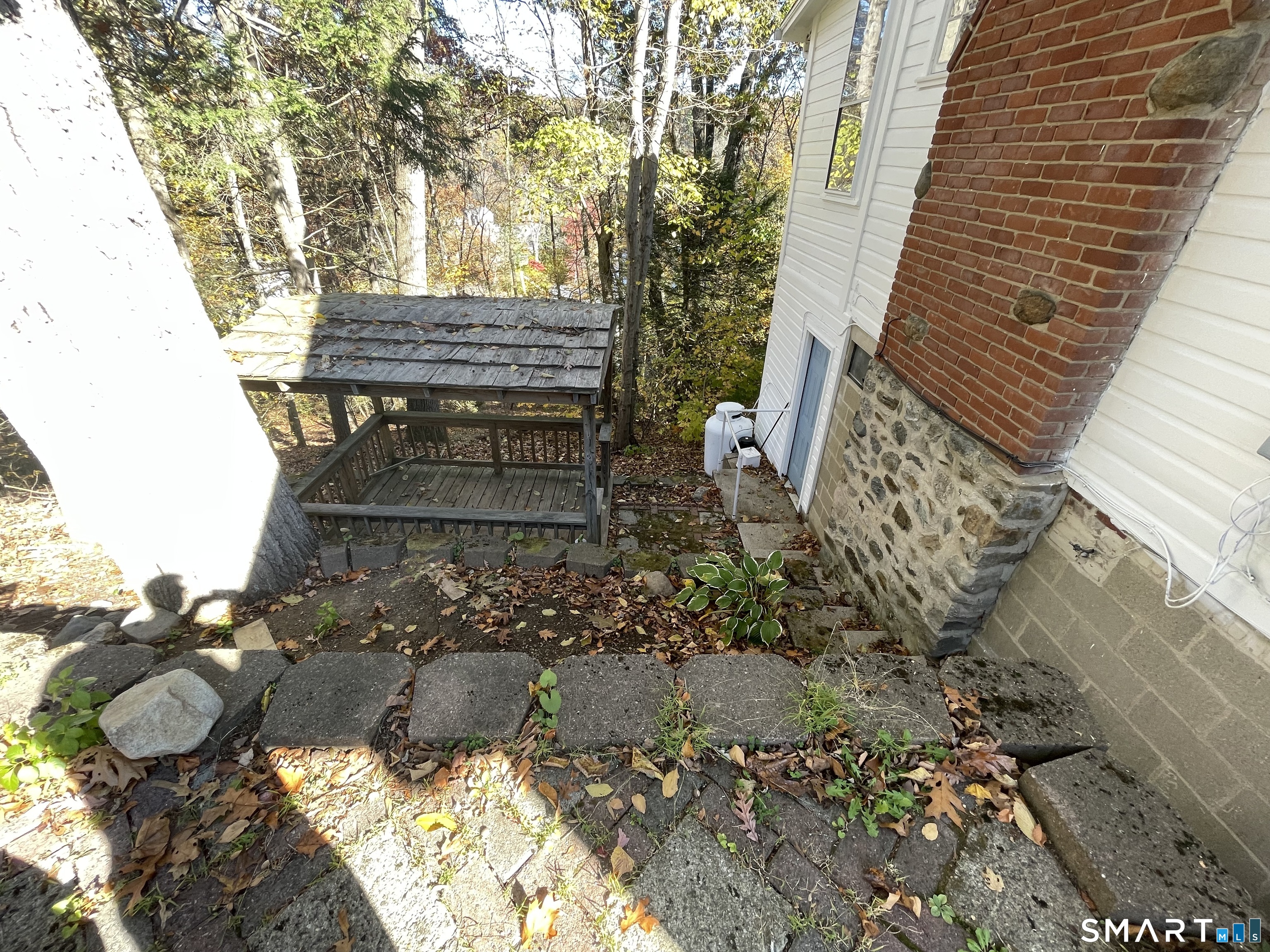 89 Alpine Drive Newtown, CT 06482 - Photo 5 of 32 a view of a back yard of the house
