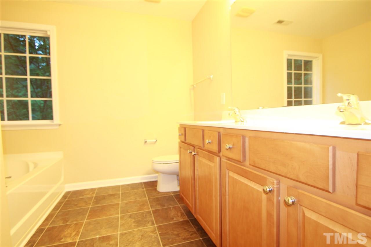 5334 Stowecroft Lane Raleigh, NC 27616 - Photo 11 of 15 a bathroom with a toilet