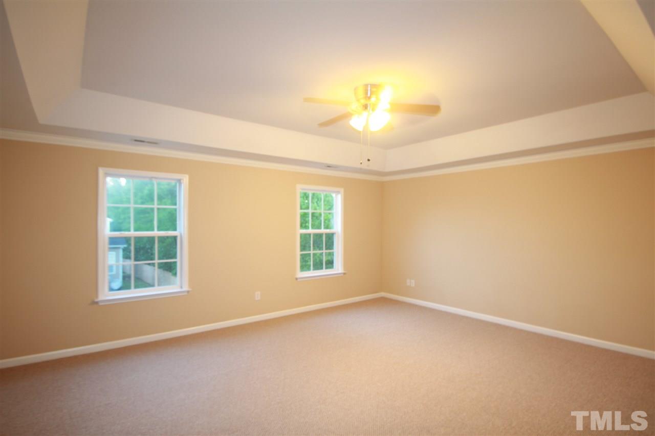5334 Stowecroft Lane Raleigh, NC 27616 - Photo 9 of 15 an empty room with a empty space and a window