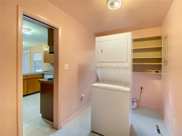 a bathroom with a sink a toilet a mirror and a bathtub