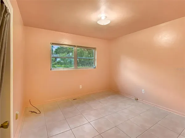 an empty room with a window