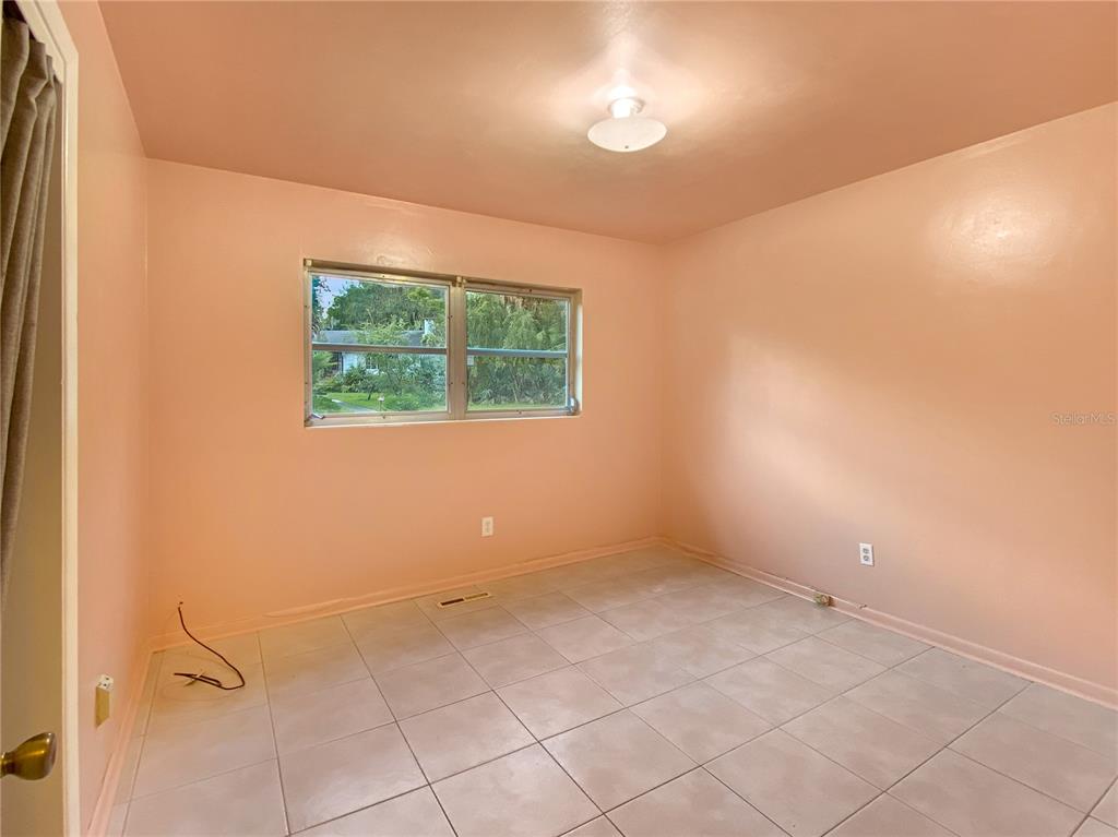 1119 Southwest 11th Avenue Gainesville, FL 32601 - Photo 16 of 30 an empty room with windows