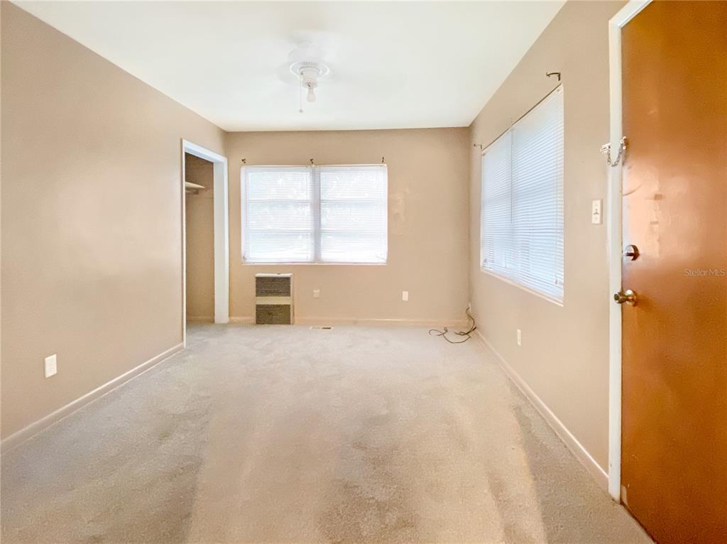 1119 Southwest 11th Avenue Gainesville, FL 32601 - Photo 27 of 30 a view of an empty room with a window