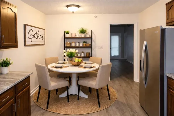 a view of a dining room with furniture