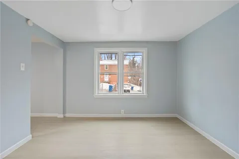 a view of a room that has a window in it