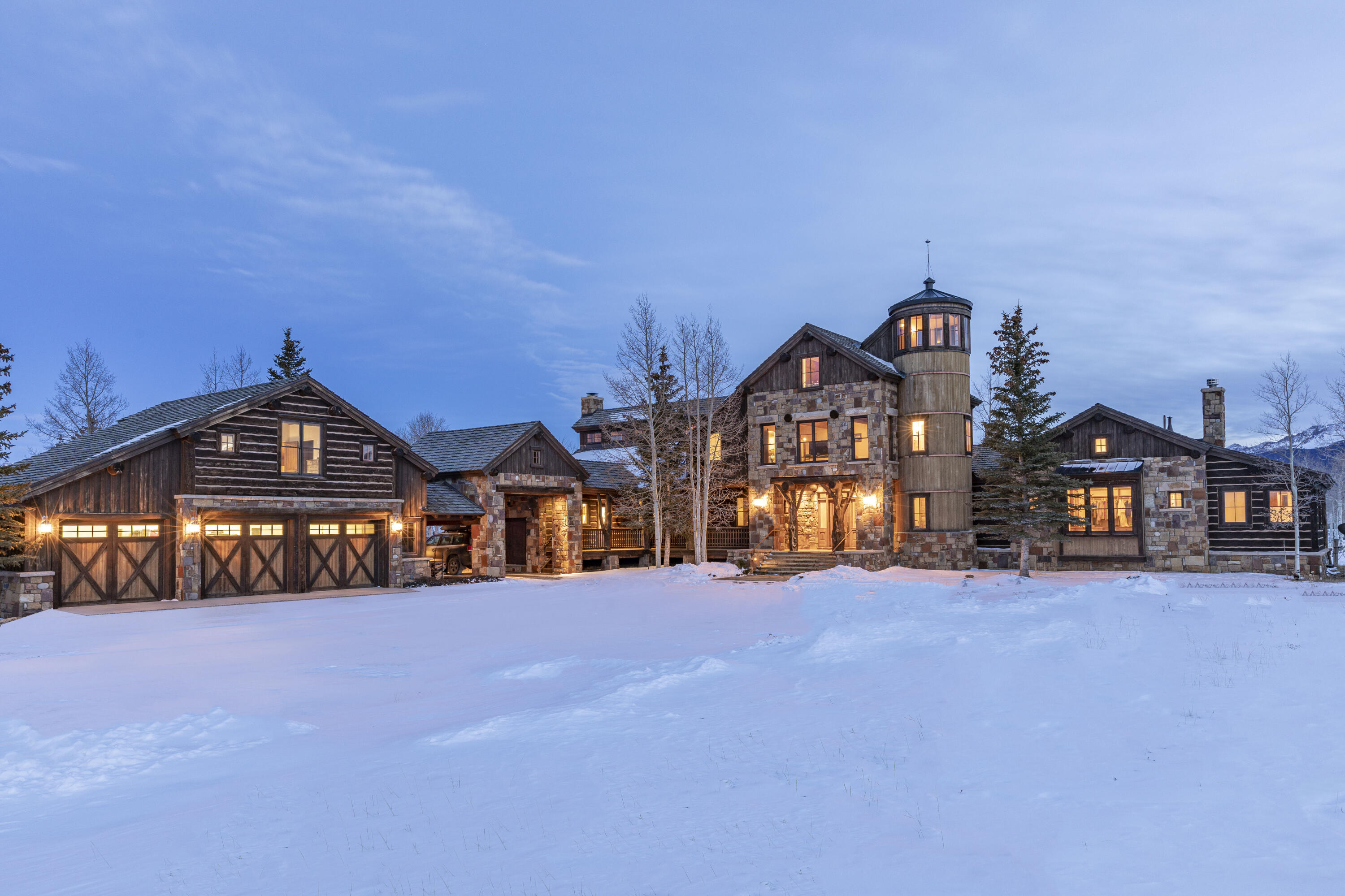 1925 East Anderson Road Placerville, CO 81430 - Photo 1 of 40 a front view of a house with large trees