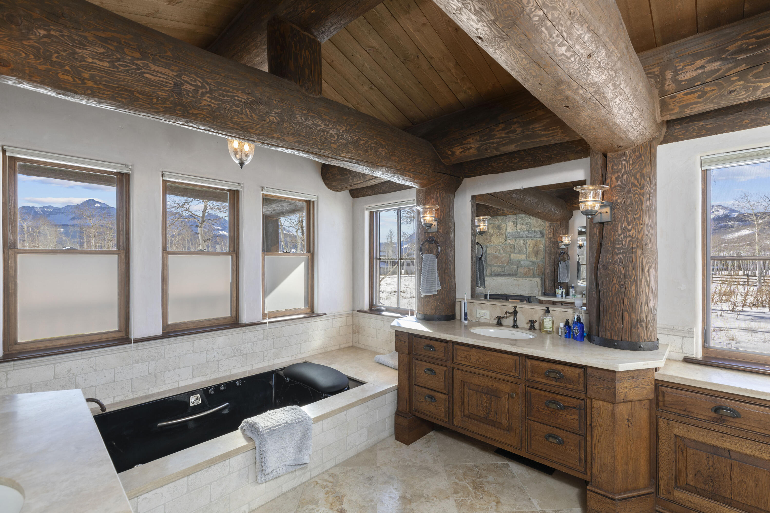 1925 East Anderson Road Placerville, CO 81430 - Photo 11 of 40 a large bathroom with a large tub and sink
