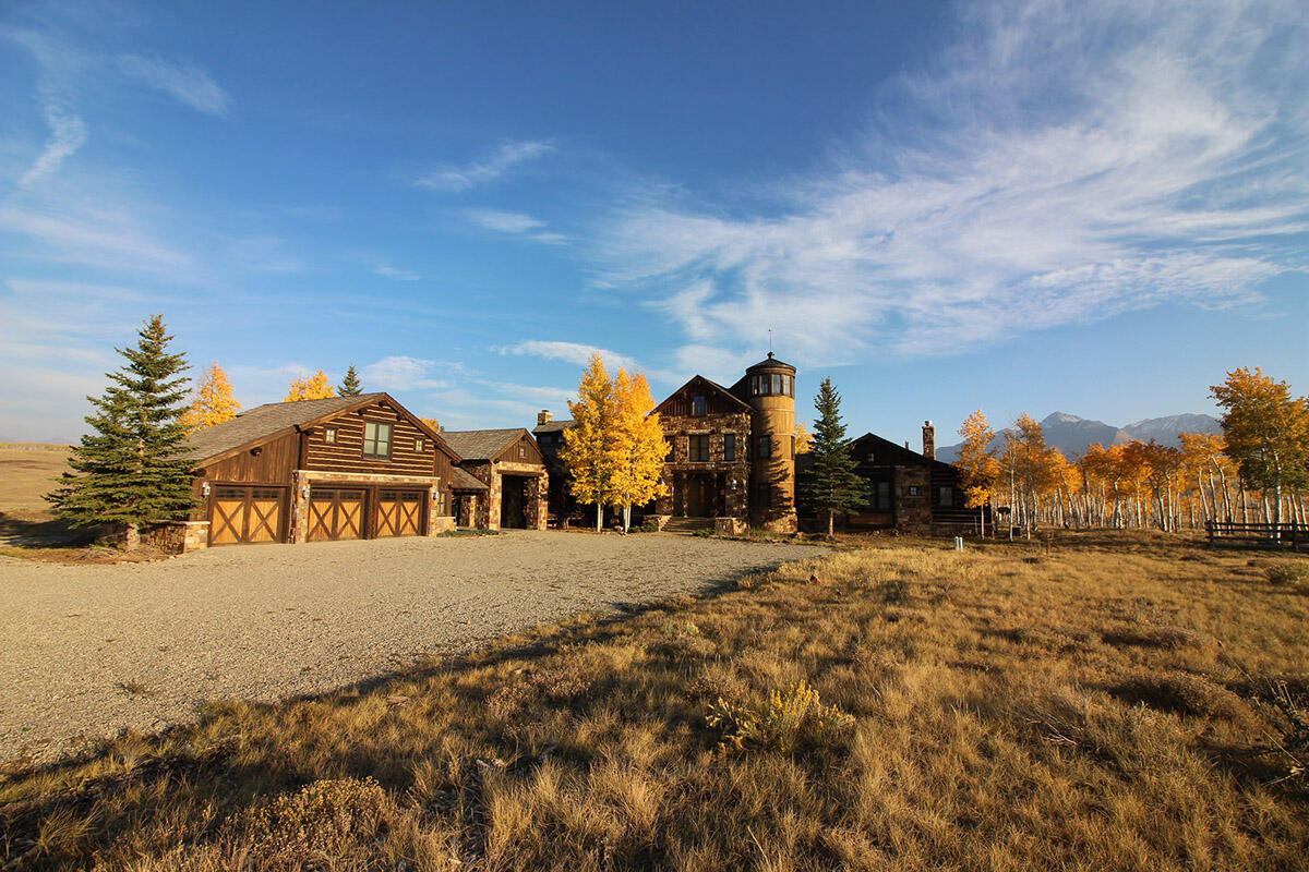 1925 East Anderson Road Placerville, CO 81430 - Photo 30 of 40 a view of a town with large trees