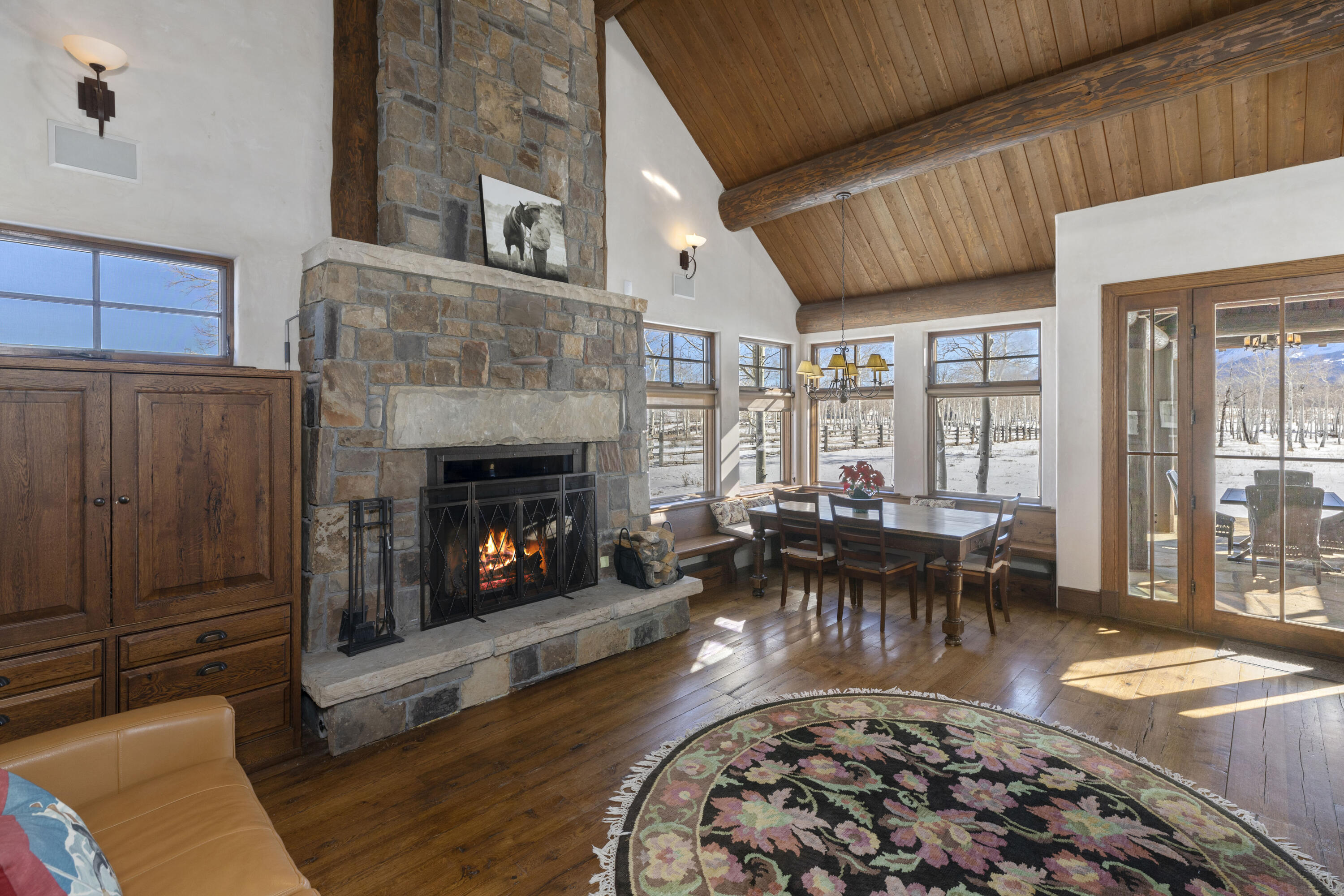 1925 East Anderson Road Placerville, CO 81430 - Photo 7 of 40 a living room with furniture and a fireplace