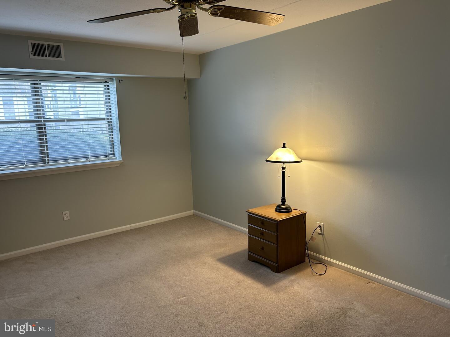 68 Welsh Tract Road, Unit D106 Newark, DE 19713 - Photo 7 of 10 a room with a window and a ceiling fan