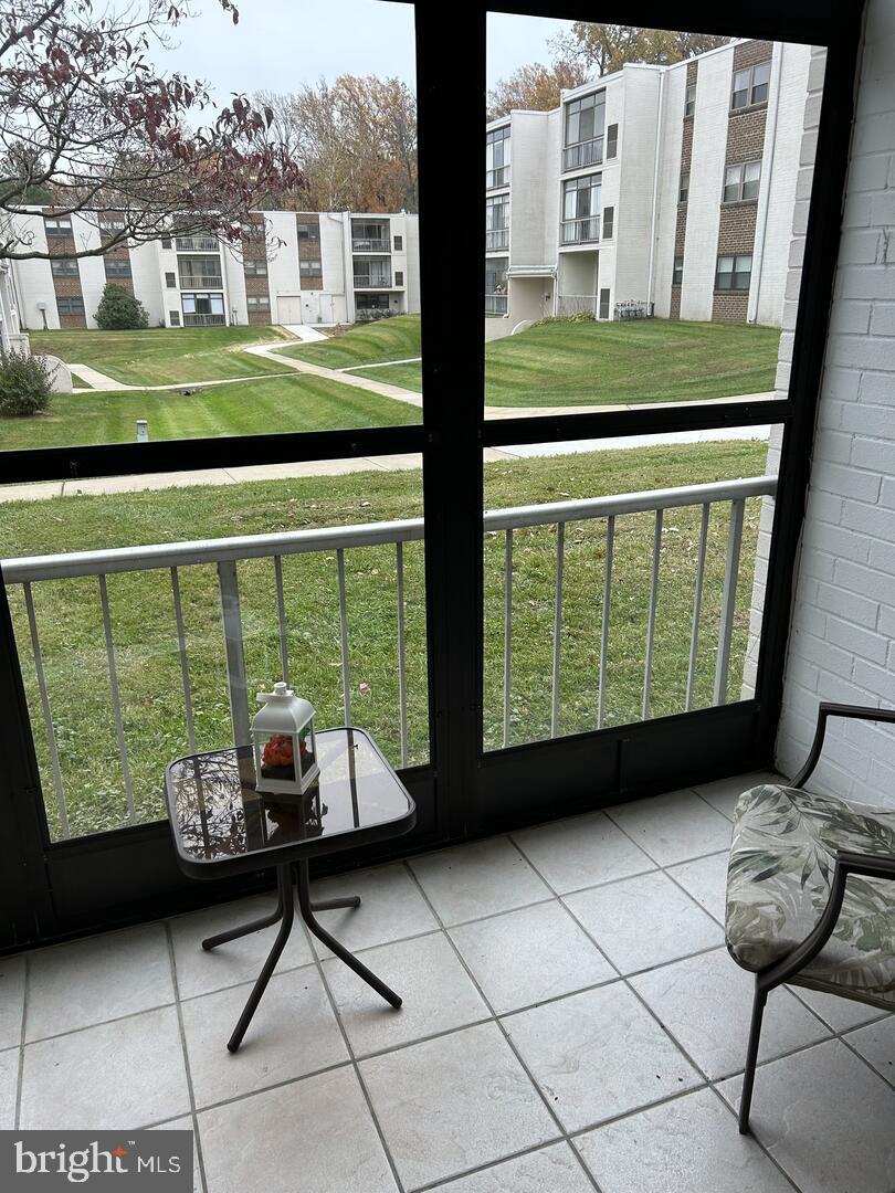 68 Welsh Tract Road, Unit D106 Newark, DE 19713 - Photo 10 of 10 a view of a two chairs in the balcony