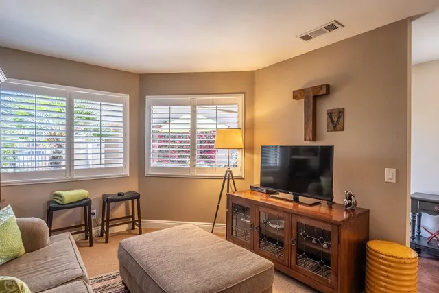 a room with furniture and a window