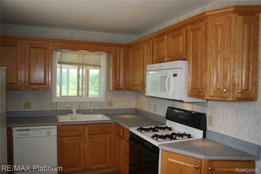 4250 Crandall Road Howell, MI 48855 - Photo 16 of 57 You won't mind washing dishes here!
