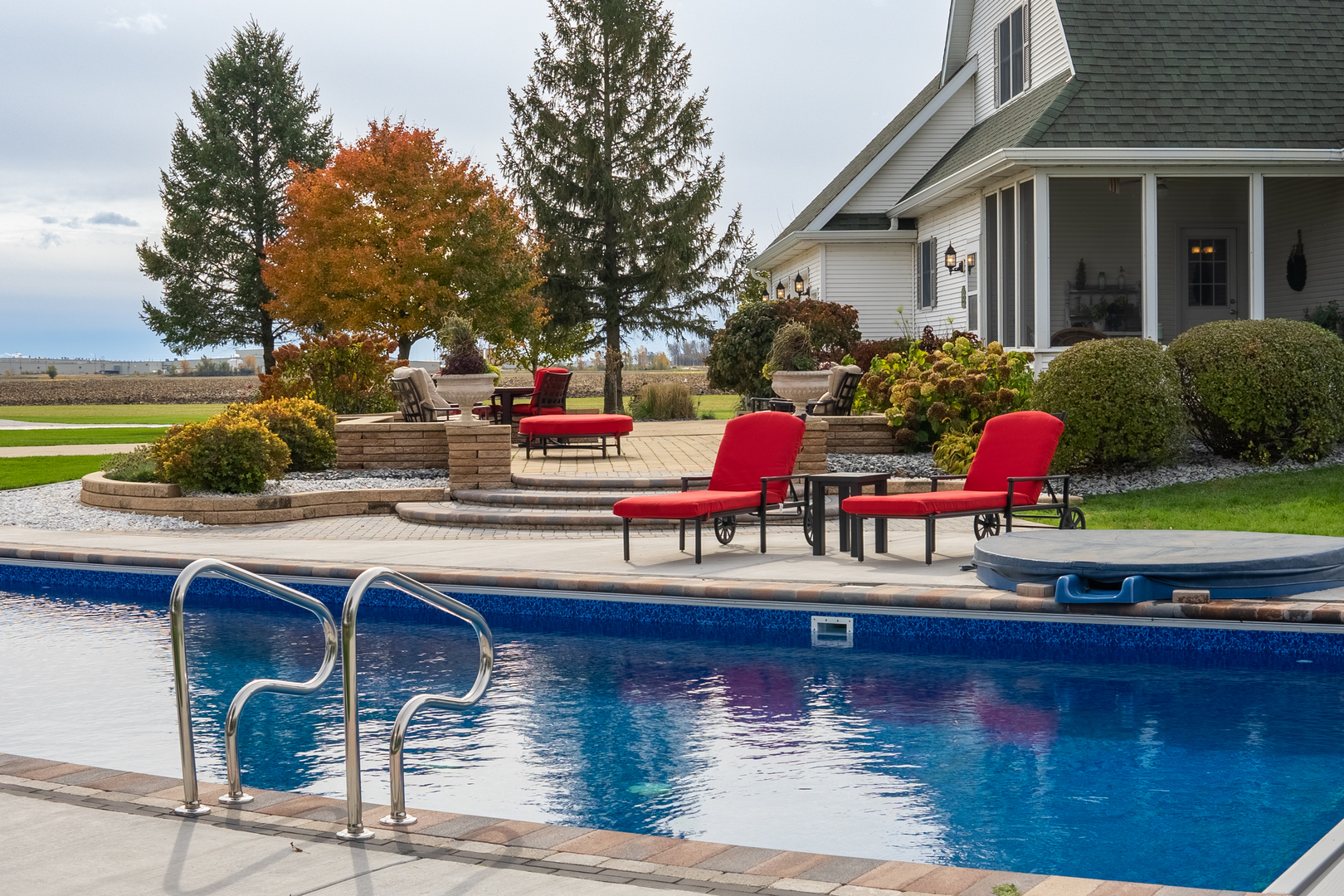 3142 East 1st Road Peru, IL 61354 - Photo 48 of 106 a swimming pool view with a outdoor seating