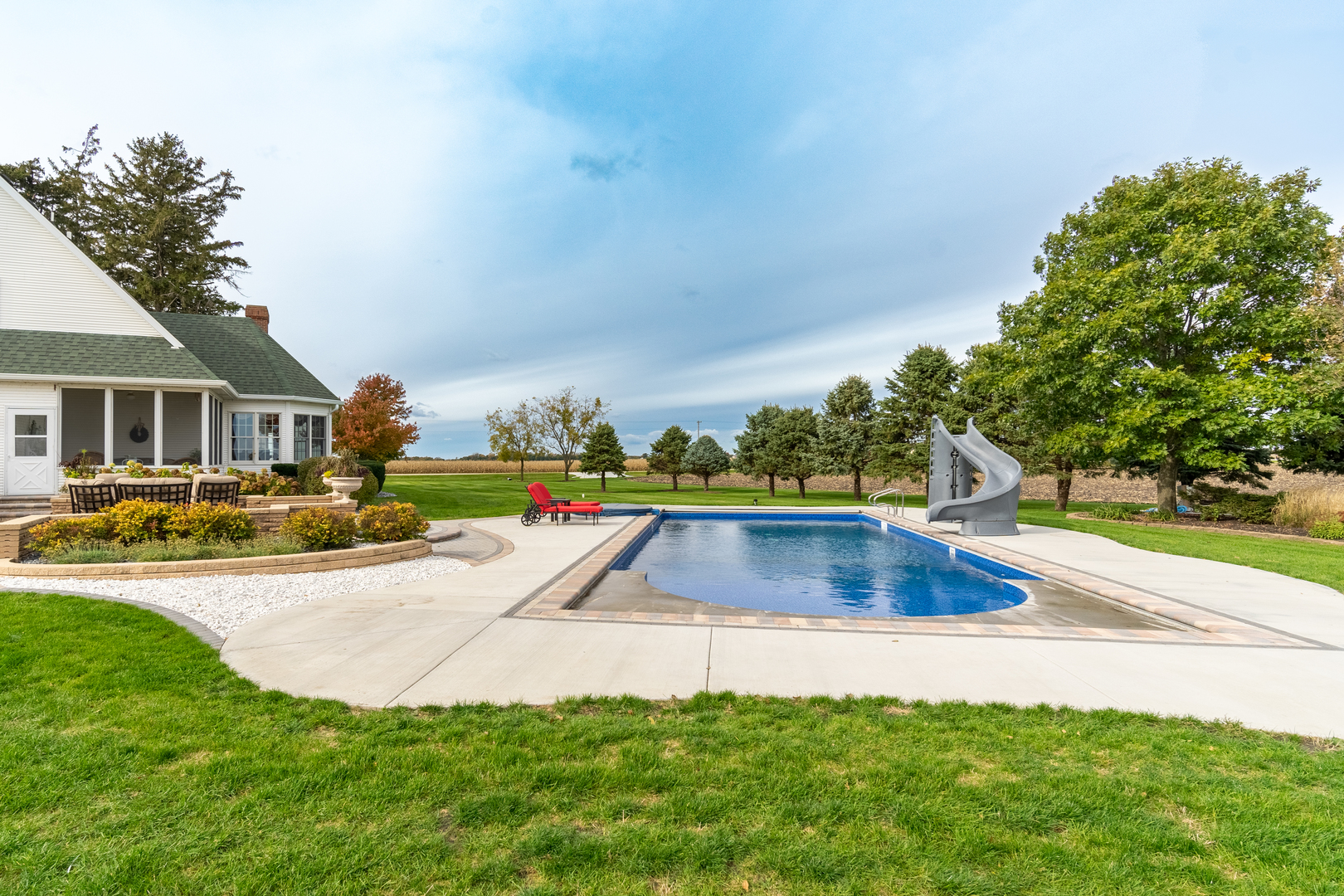 3142 East 1st Road Peru, IL 61354 - Photo 54 of 106 a view of outdoor space yard deck and swimming pool