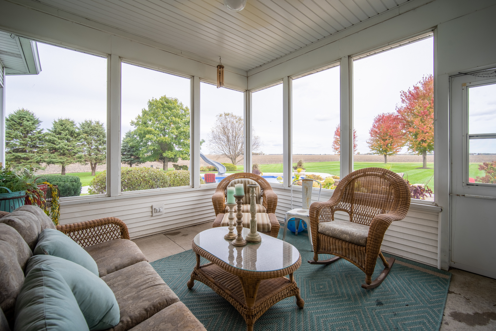 3142 East 1st Road Peru, IL 61354 - Photo 71 of 106 a living room with furniture and floor to ceiling windows