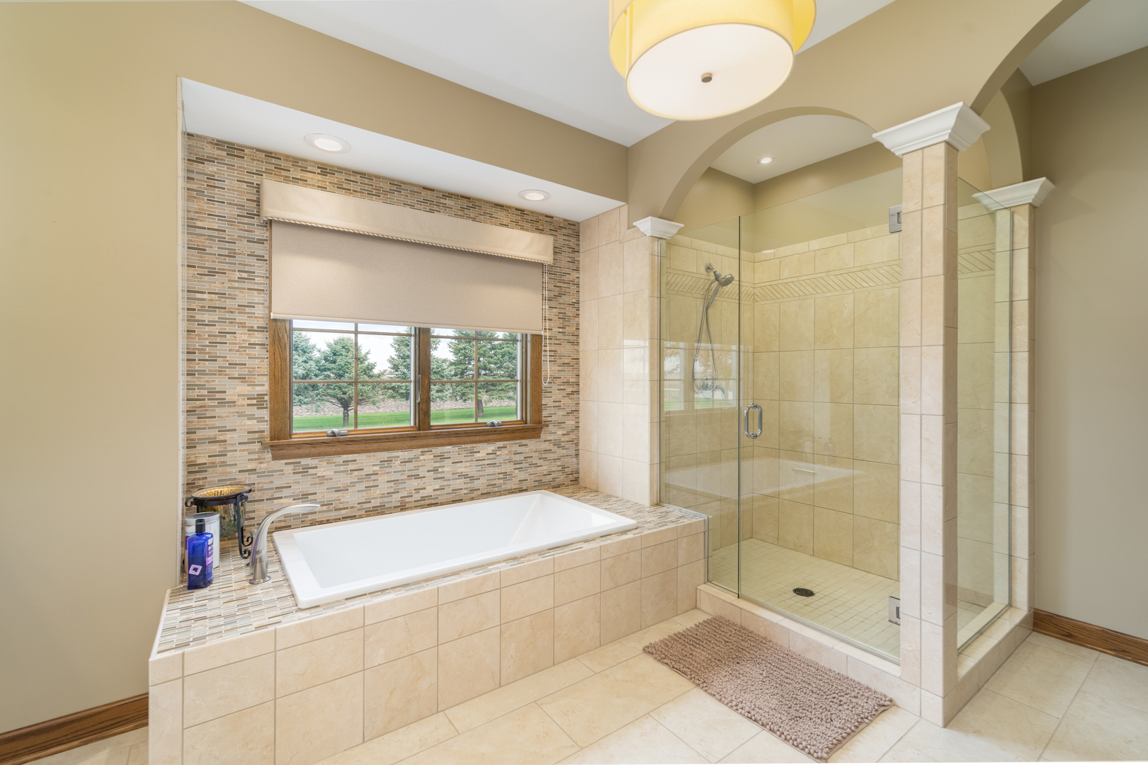 3142 East 1st Road Peru, IL 61354 - Photo 94 of 106 a bathroom with a bathtub and a shower