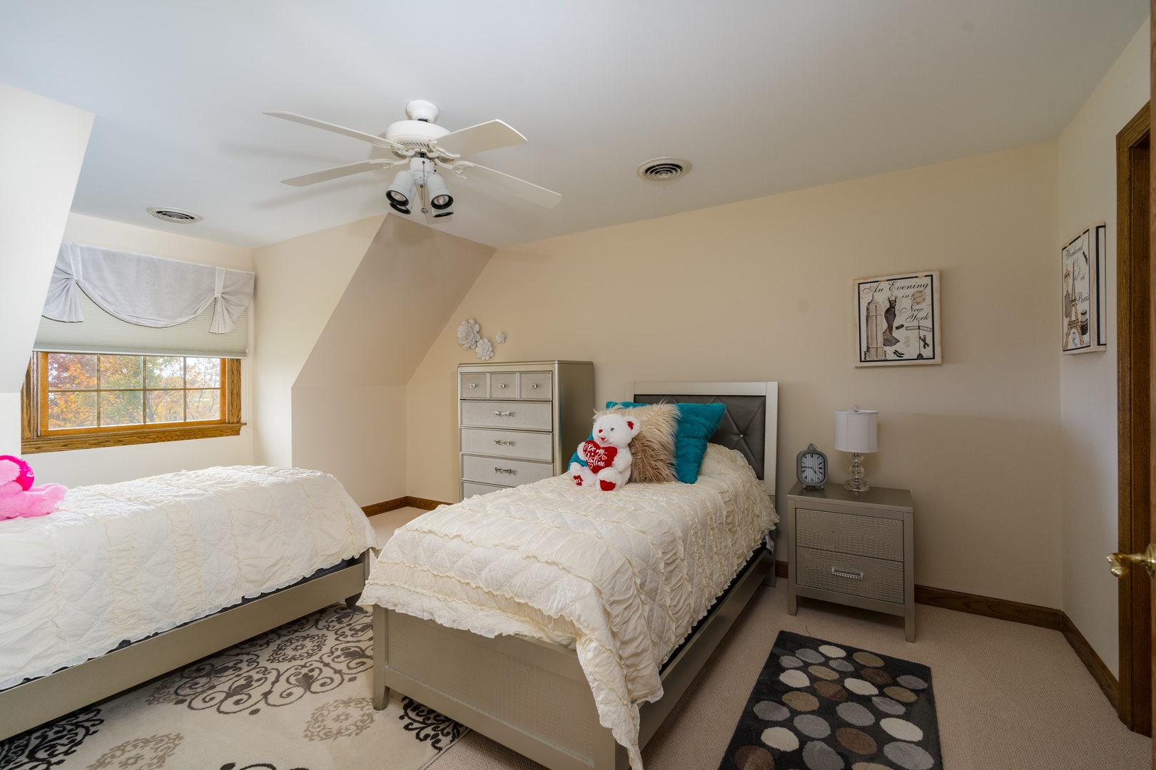 3142 East 1st Road Peru, IL 61354 - Photo 96 of 106 a bedroom with a bed and a chandelier