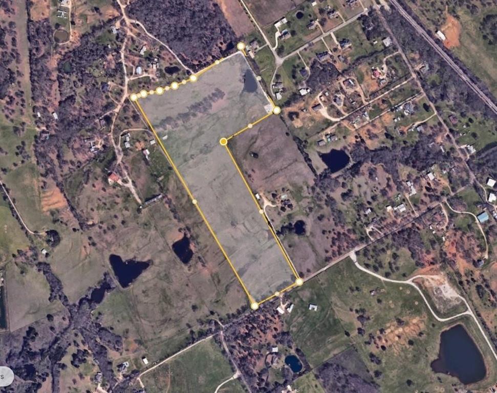 4306-tbd Slayton Road Cleburne, TX 76031 - Photo 2 of 2 a city view with tall trees