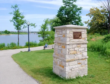 a front view of a house with a train yard